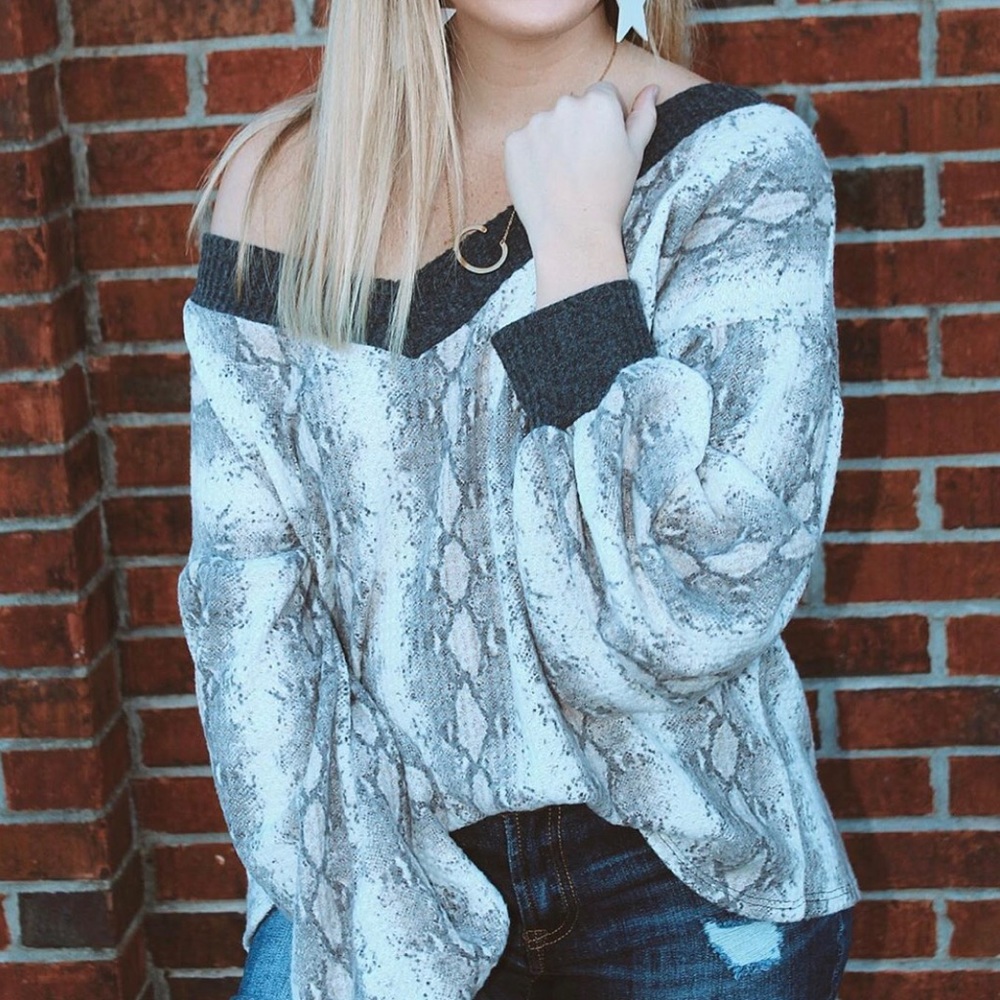 V-neck snake print top